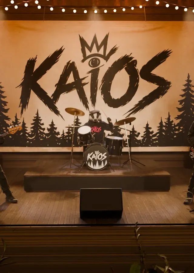 Bert the Badger behind the kit, under the KAiOS banner